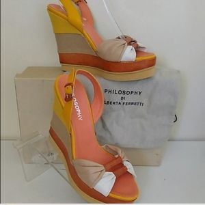 Philosophy platform gold shoe